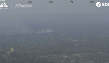 Brush fire threatens Bay Terraces homes