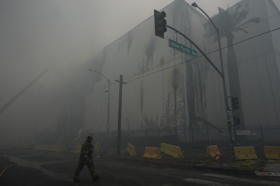 Los Angeles firefighters are on day 6 of battle against massive warehouse fire