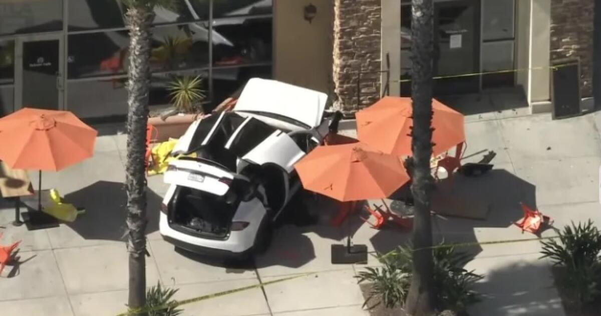Woman pinned under Tesla in fatal crash at SoCal shopping center
