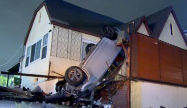 Car flips, winds up vertical on the porch of an L.A. home
