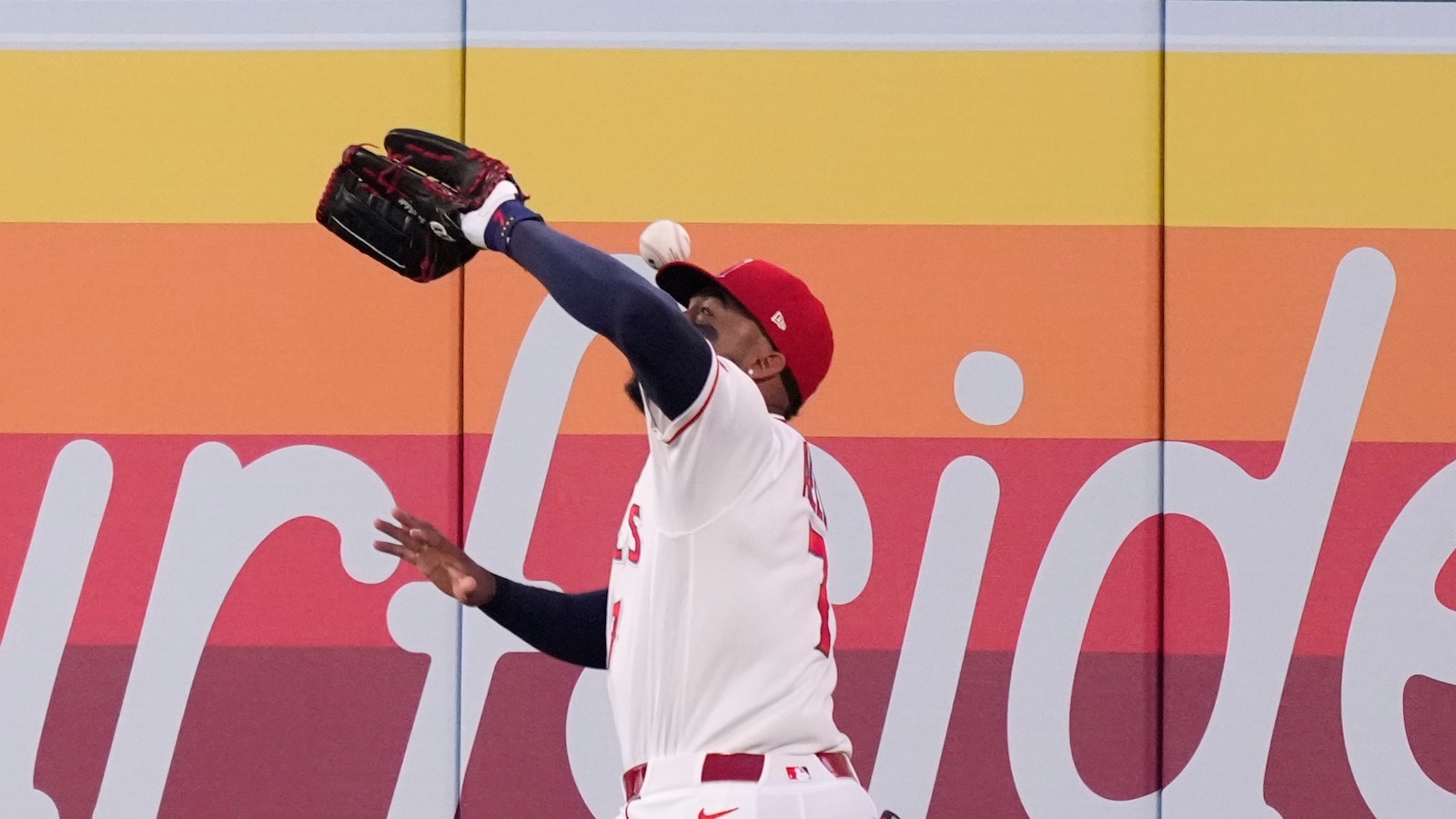 Rumfield gets gift homer when flyball bounces off Adell's head as Rockies top Angels 8-2