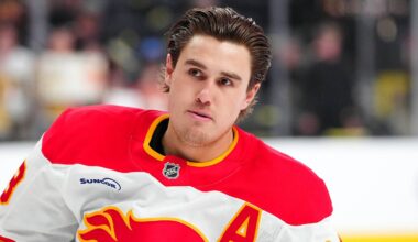 Apr 2, 2026; Las Vegas, Nevada, USA; Calgary Flames defenseman Zach Whitecloud (28) warms up before a game against the Vegas Golden Knights at T-Mobile Arena. Mandatory Credit: Stephen R. Sylvanie-Imagn Images