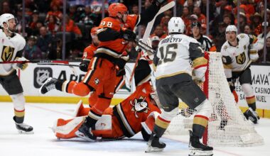 May 14, 2026; Anaheim, California, USA;  Anaheim Ducks defenseman Pavel Mintyukov (98) clears the puck with his hand during the first period against the Vegas Golden Knights in game six of the second round of the 2026 Stanley Cup Playoffs at Honda Center. Mandatory Credit: Kiyoshi Mio-Imagn Images