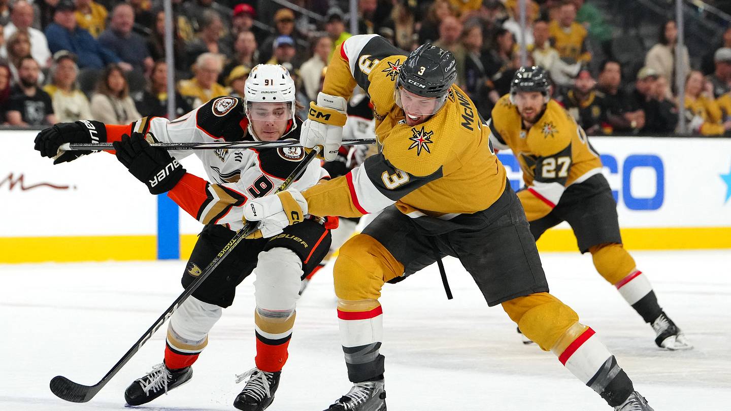 Apr 18, 2024; Las Vegas, Nevada, USA; Vegas Golden Knights defenseman Brayden McNabb (3) looks to sweep the puck away from Anaheim Ducks center Leo Carlsson (91) during the first period at T-Mobile Arena. Mandatory Credit: Stephen R. Sylvanie-USA TODAY Sports