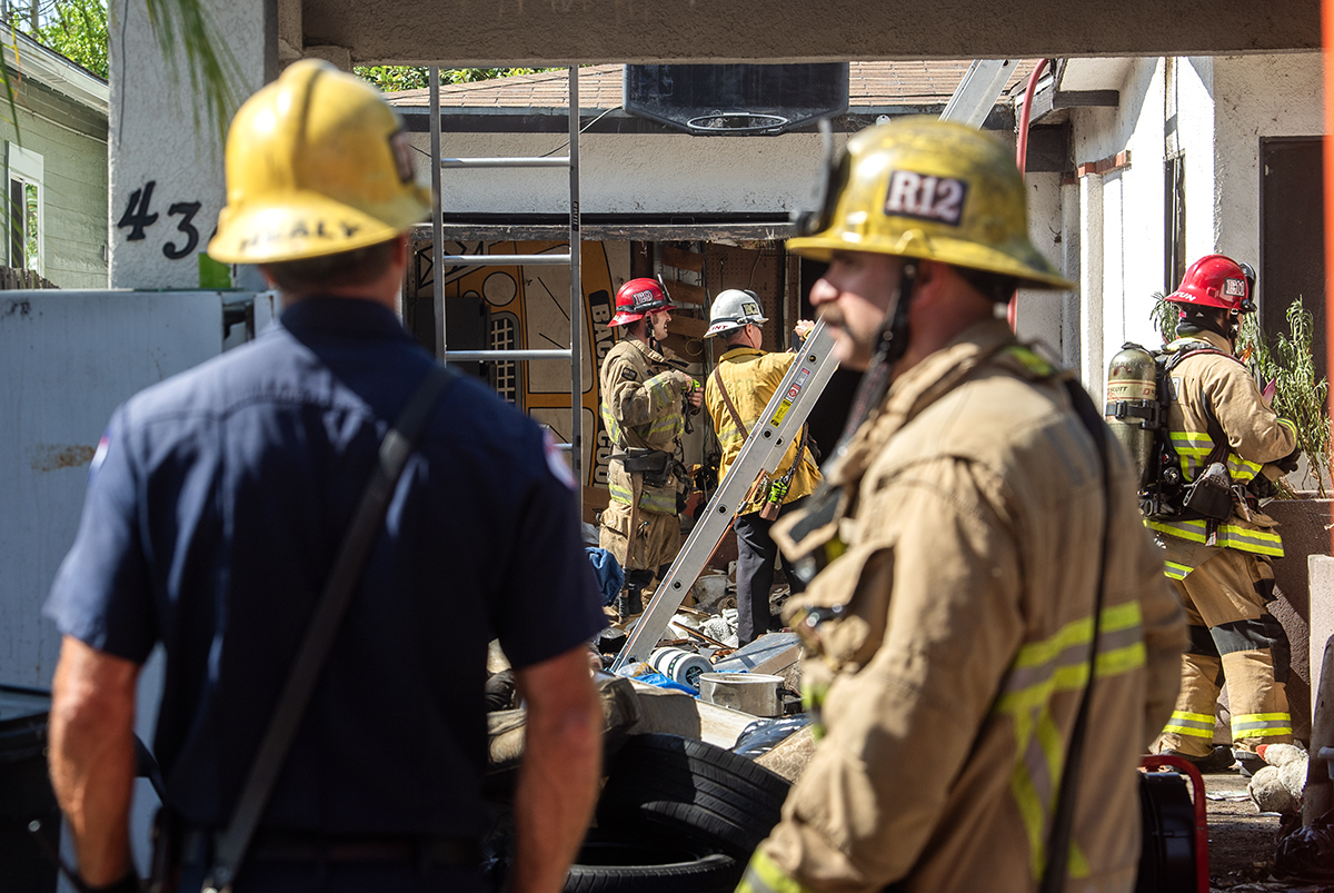 North Long Beach home filled with trash catches fire
