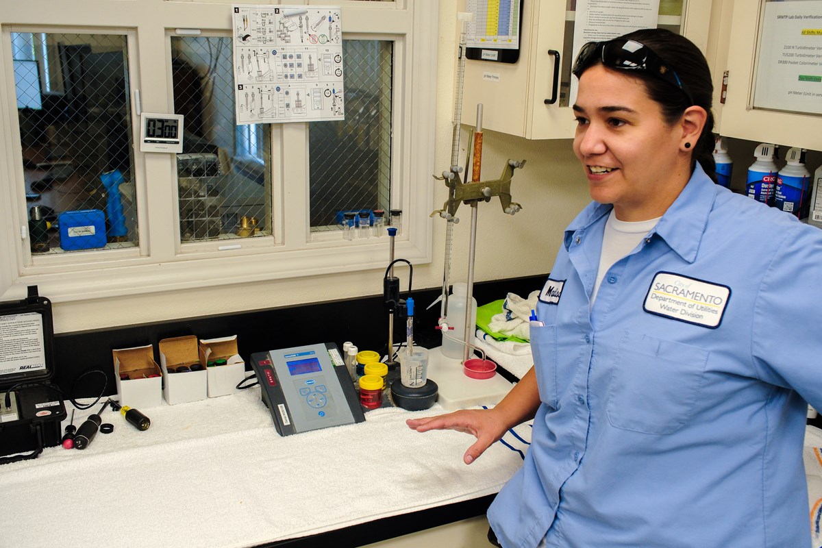 Senior Plant Operator Madison Malicki demonstrates water testing.