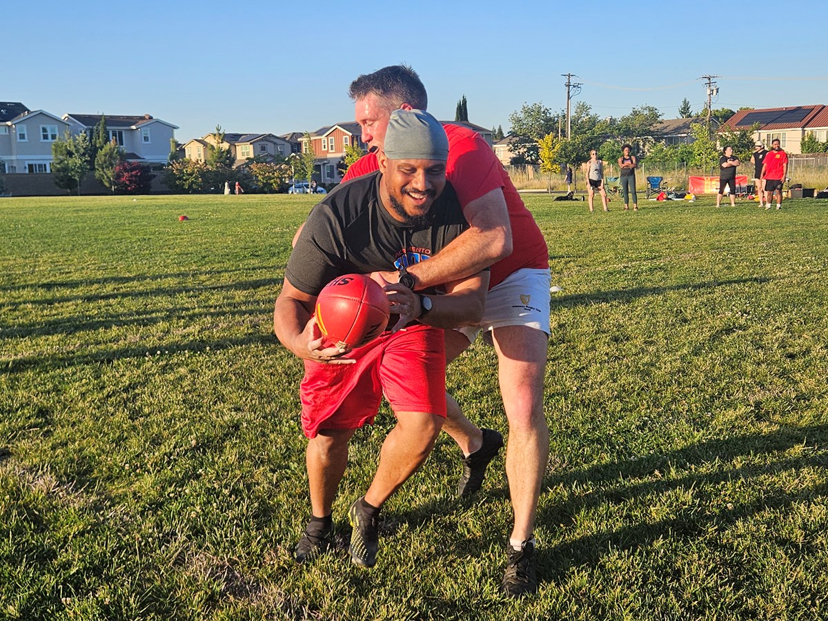 Stan Rucker (left) tangles with Cody McElligott (right) during a tackling drill on Wednesday, April 29, 2026 at Airfield Park in Natomas.