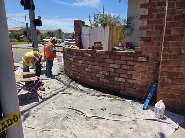 Jeep tears through Rossmoor entrance wall, masons use brick stockpile to quickly repair