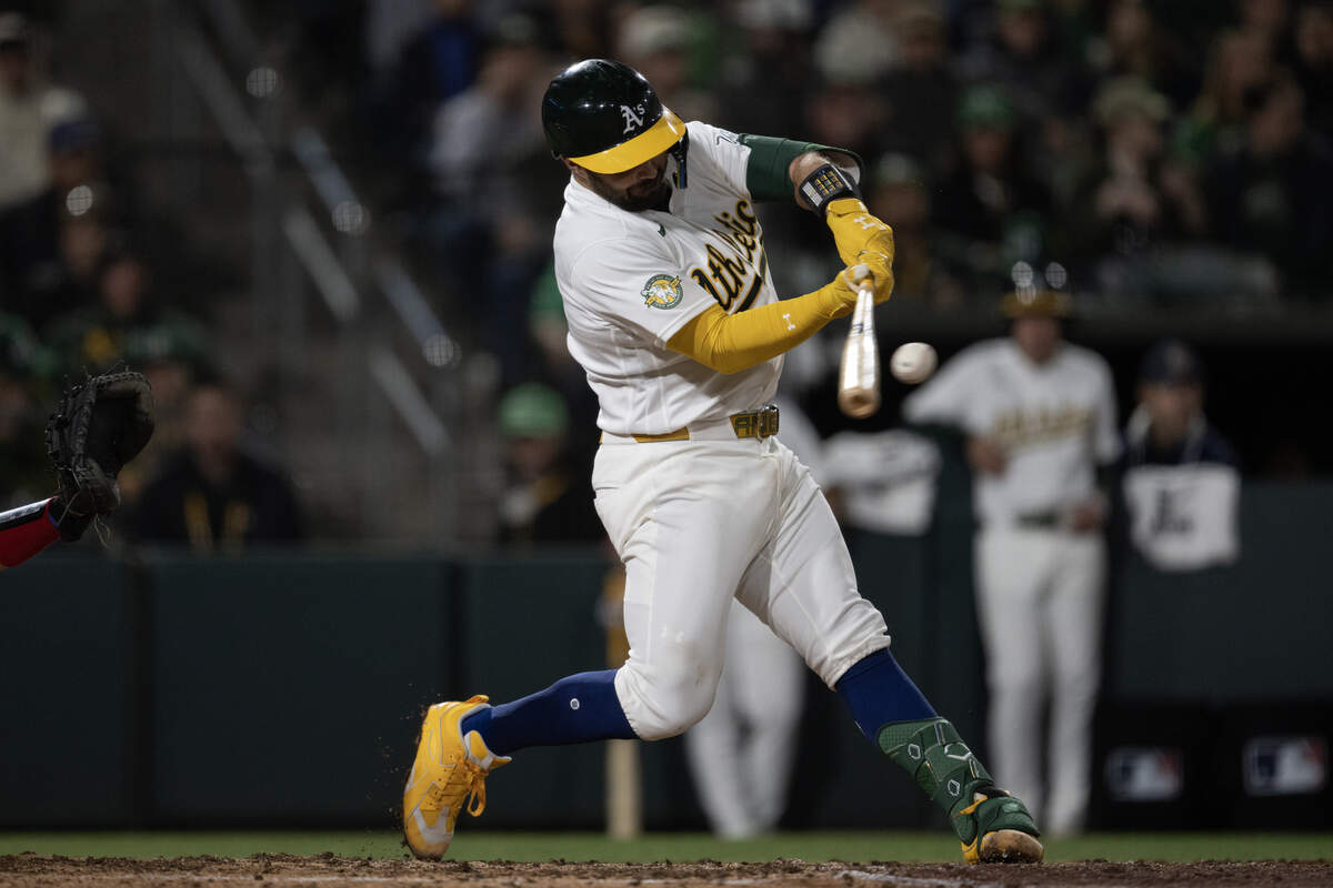 Athletics batter Shea Langeliers hits a three run homer off Texas Rangers pitcher Cole Winn in the bottom of the sixth inning at Sutter Health Park on April 15 in West Sacramento. Langeliers will start the All-Star Game at catcher Tuesday.
