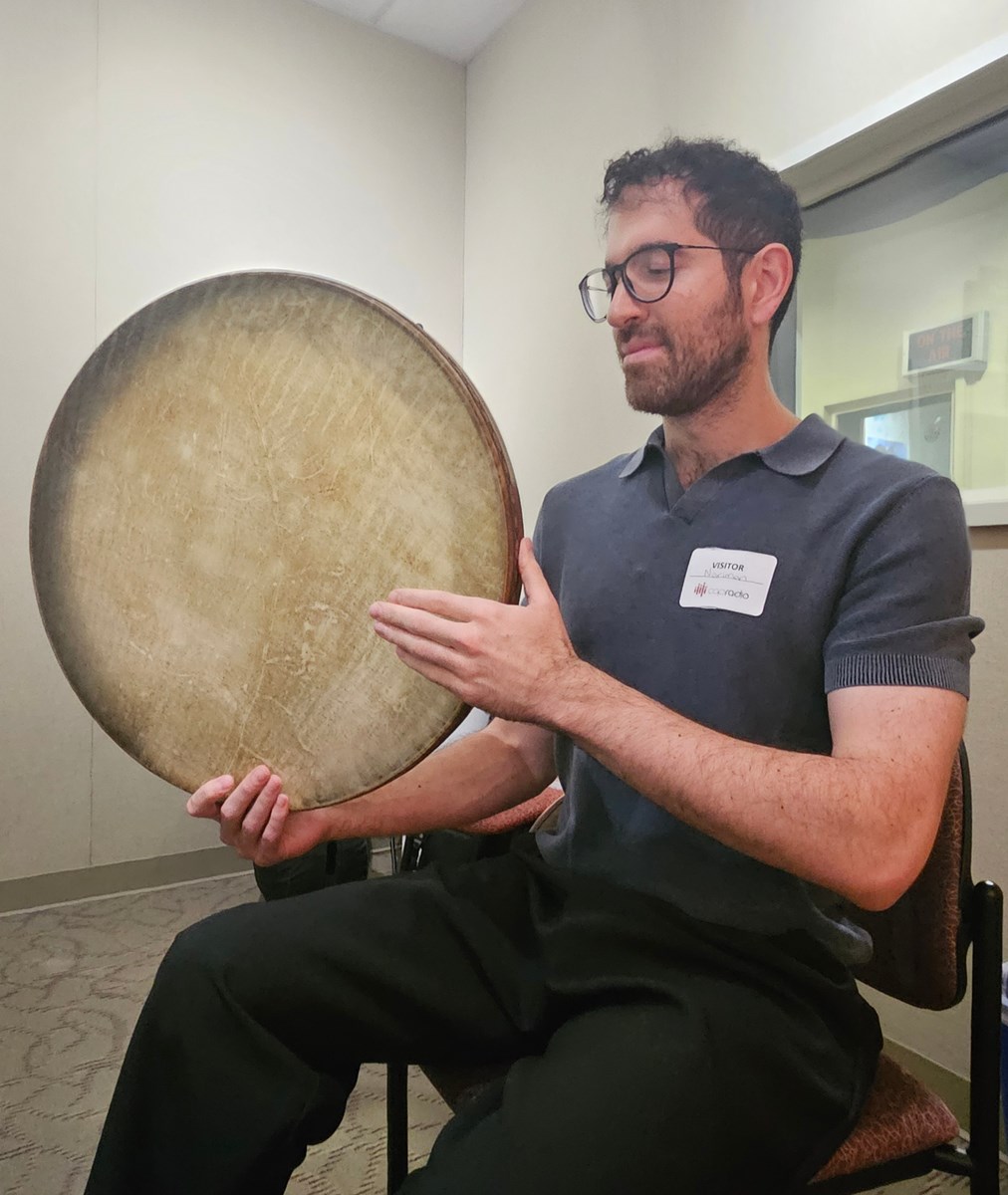 Nariman Assadi has played percussion instruments since he was 13 years old. He is seen here holding the Iranian frame drum called the Daf.