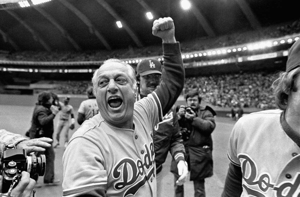 Dodgers manager Tommy Lasorda celebrates after the Dodgers beat the Montreal Expos to win the NL pennant in 1981.
