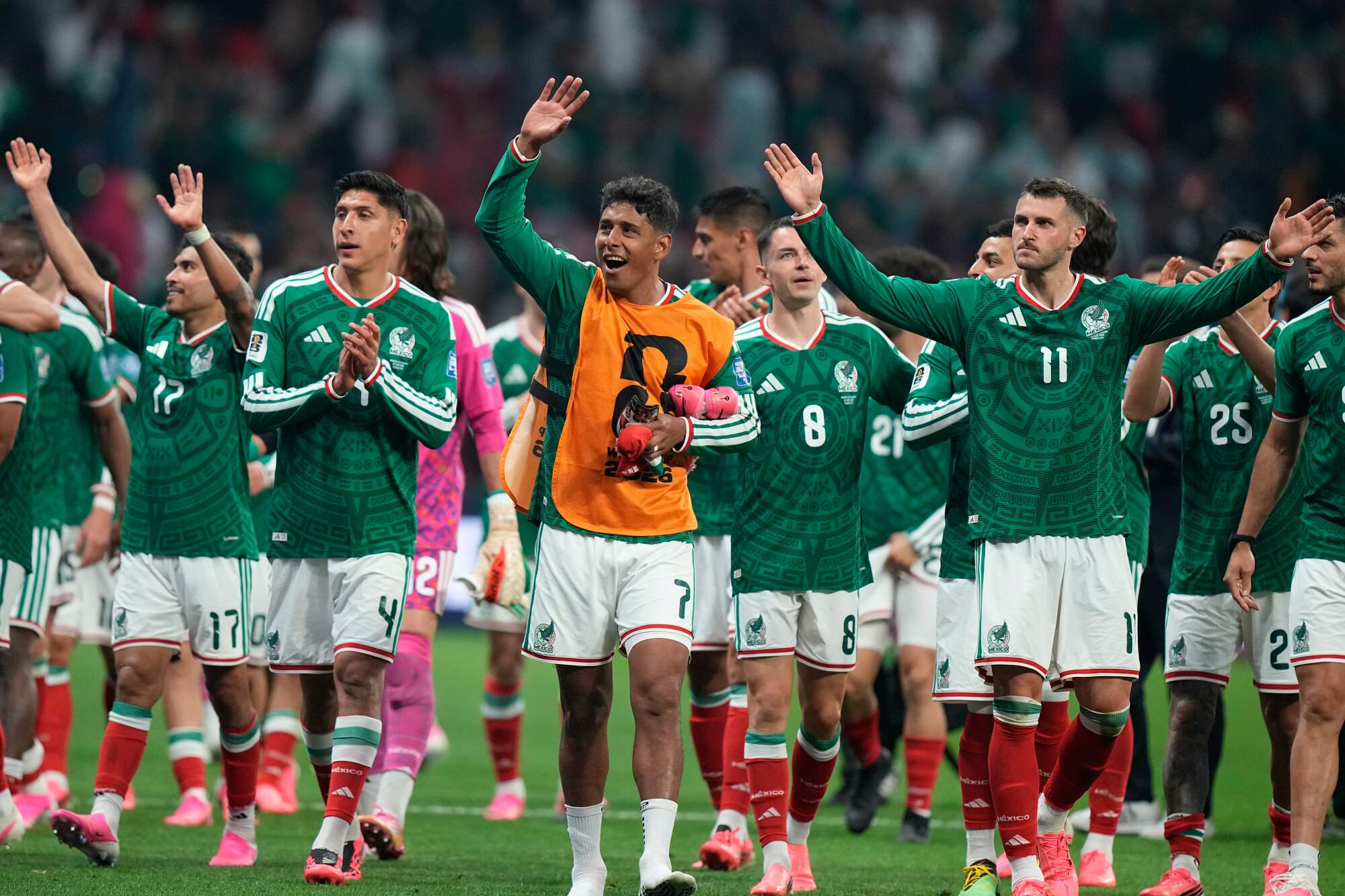 Mexico players celebrate after the World Cup round of 32 win over Ecuador in Mexico City on Tuesday.