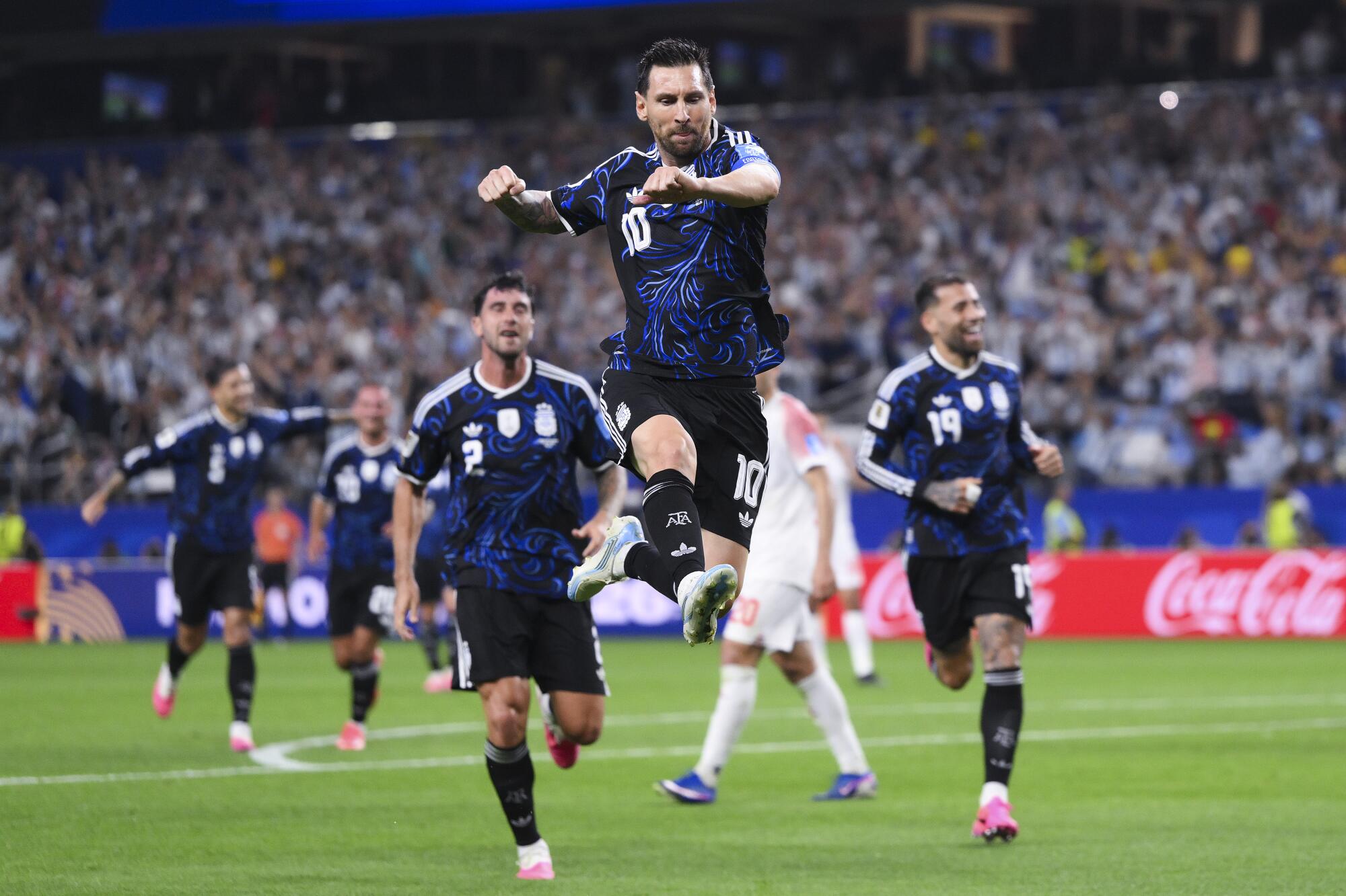 Argentina star Lionel Messi celebrates after scoring against Jordan at the World Cup on June 27.