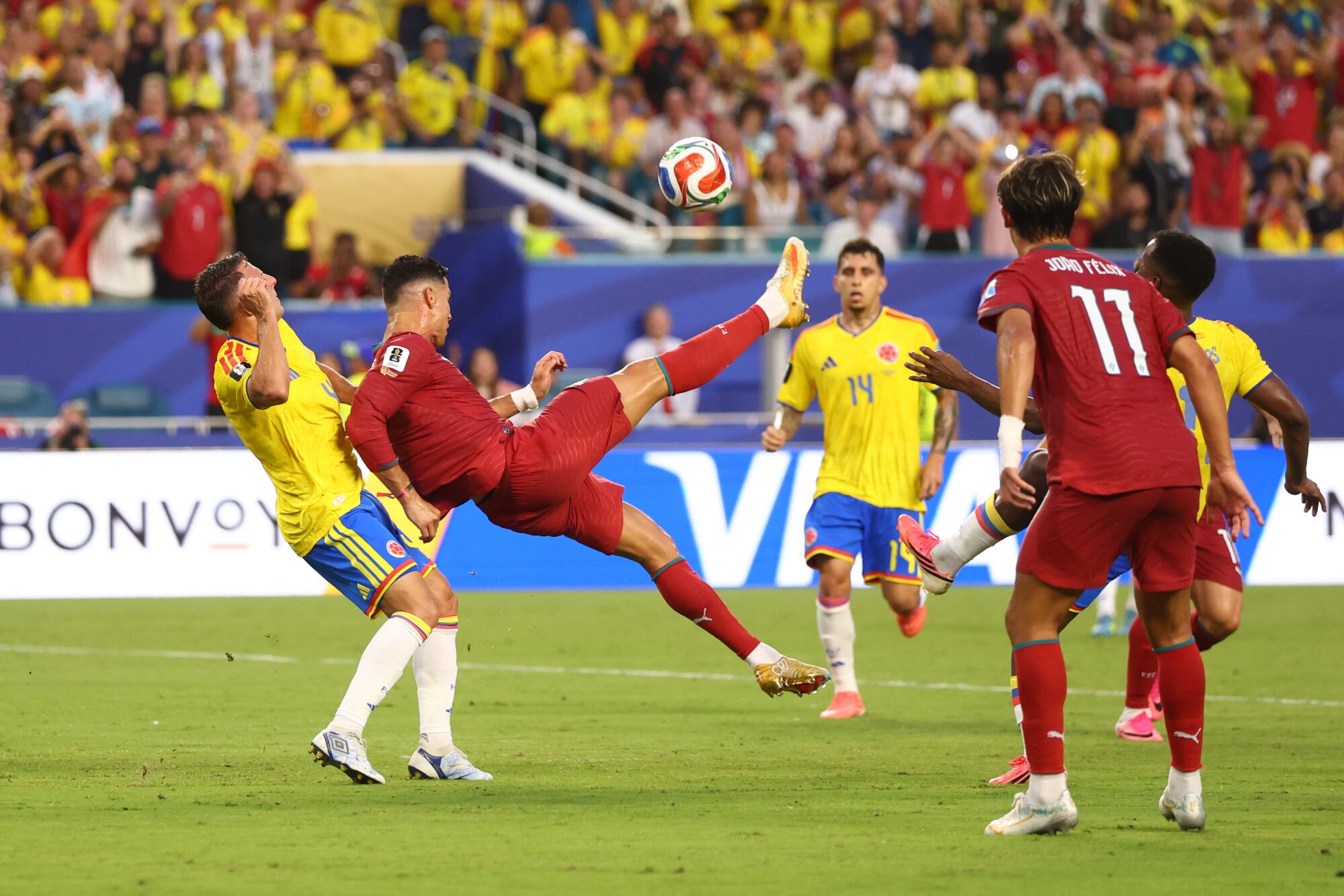 Portugal star Cristiano Ronaldo attempts an overhead kick against Colombia at the World Cup on June 27.