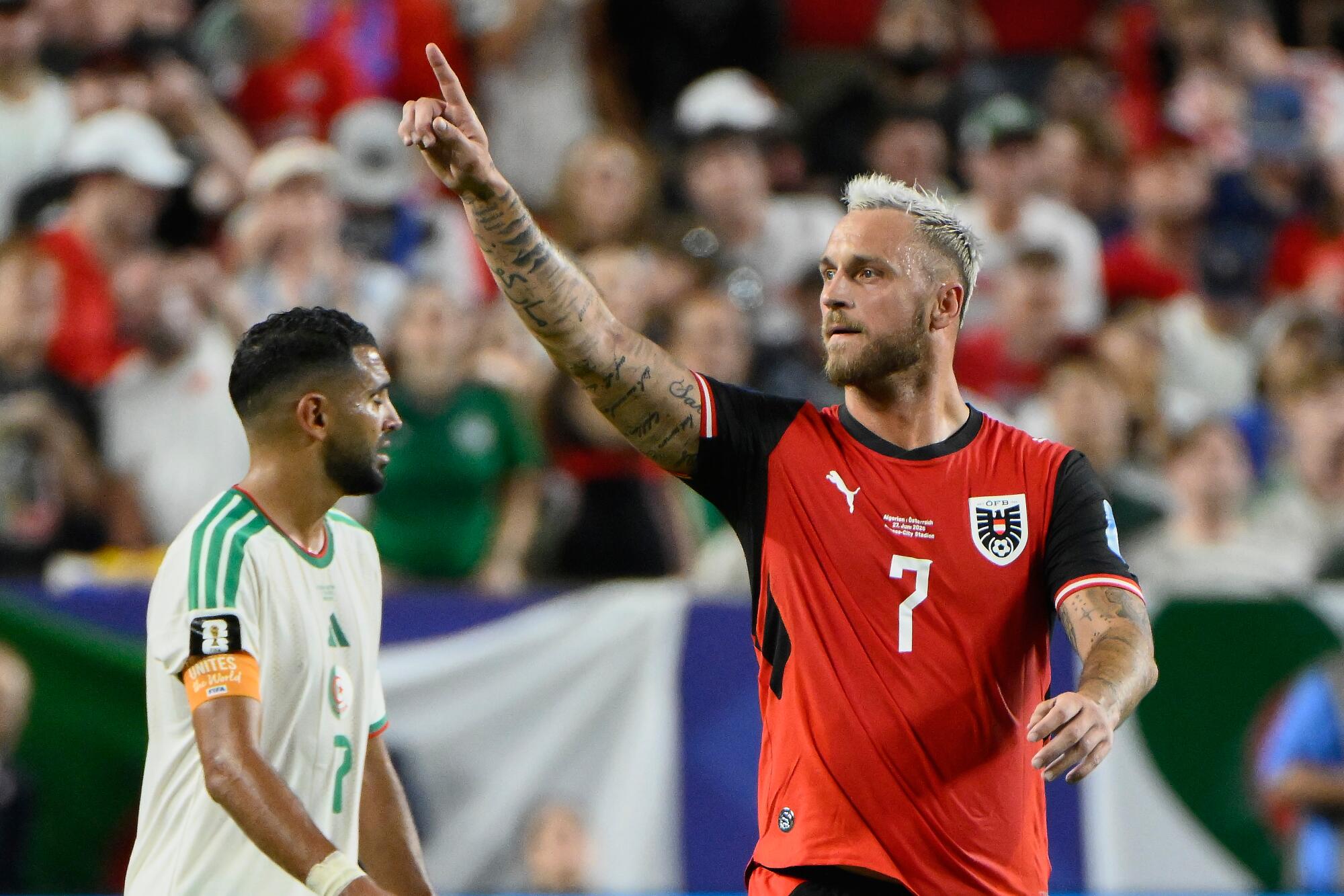 Austria's Marko Arnautovic celebrates after a goal against Algeria on June 27 at the World Cup.