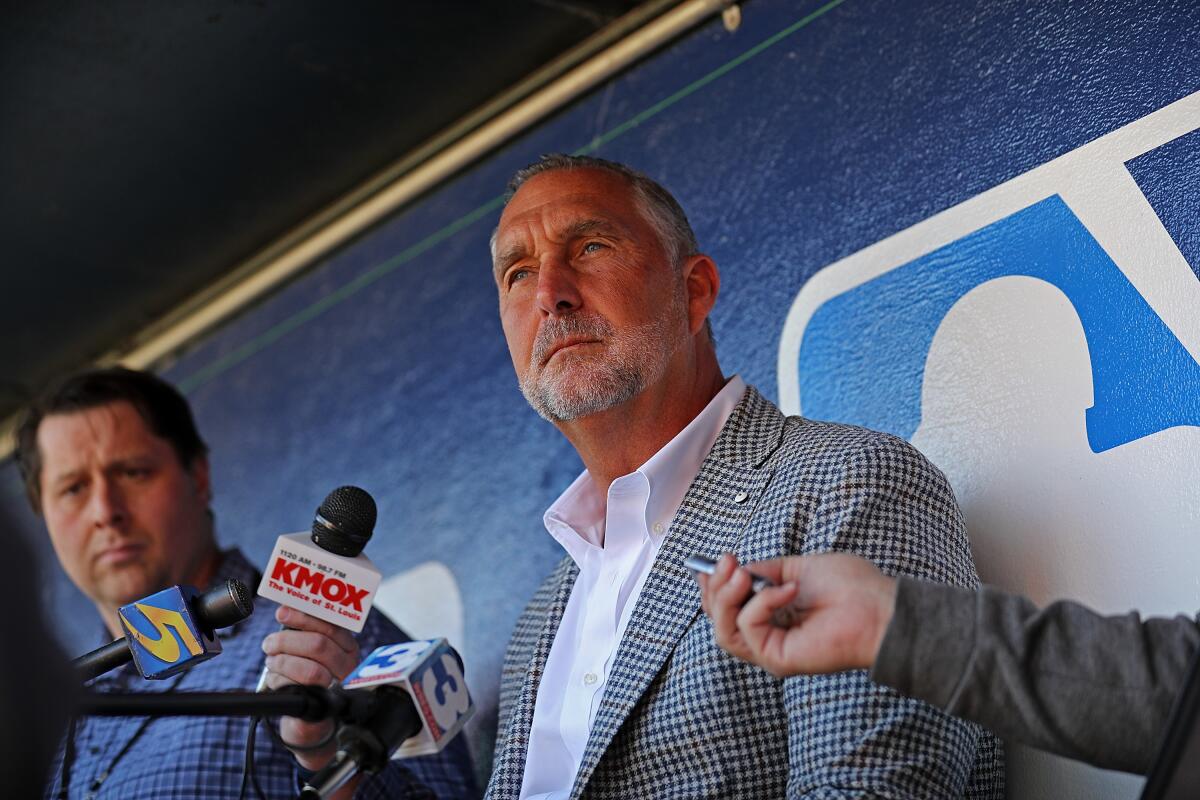 John Mozeliak, then president of baseball operations of the St. Louis Cardinals answers questions from the media.