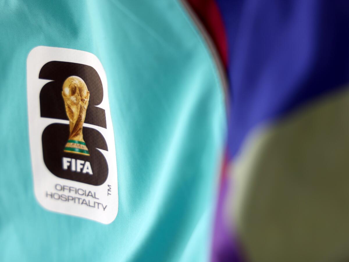 FIFA emblems are featured on jerseys.