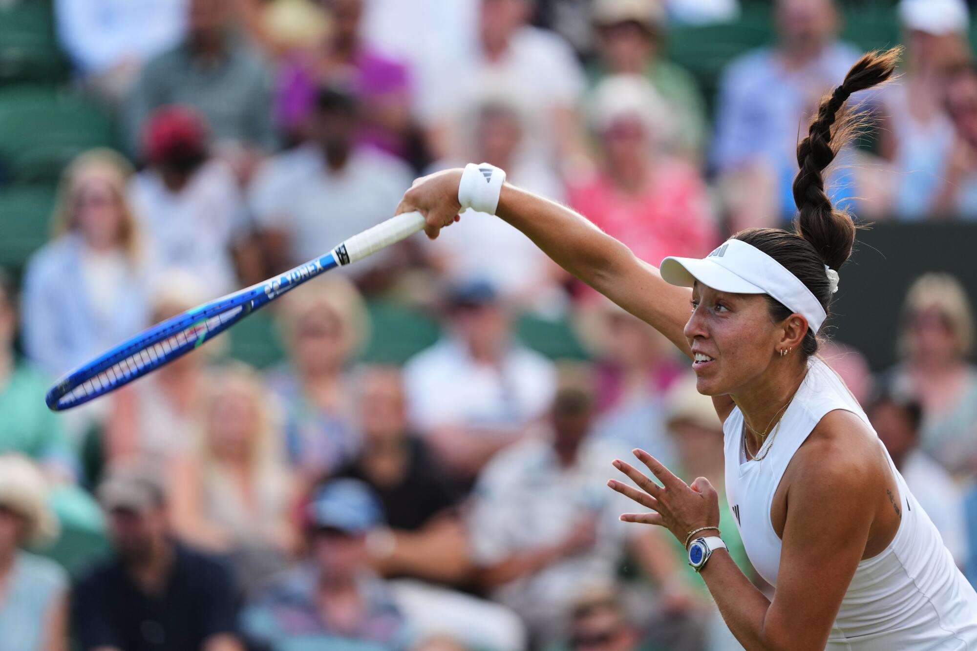 American Jessica Pegula serves the ball during a match against Spain's Sara Sorribes Tormo at Wimbledon on Wednesday.