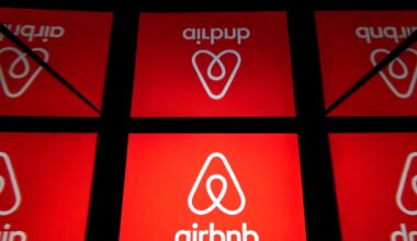 Multiple red panels displaying the Airbnb logo.