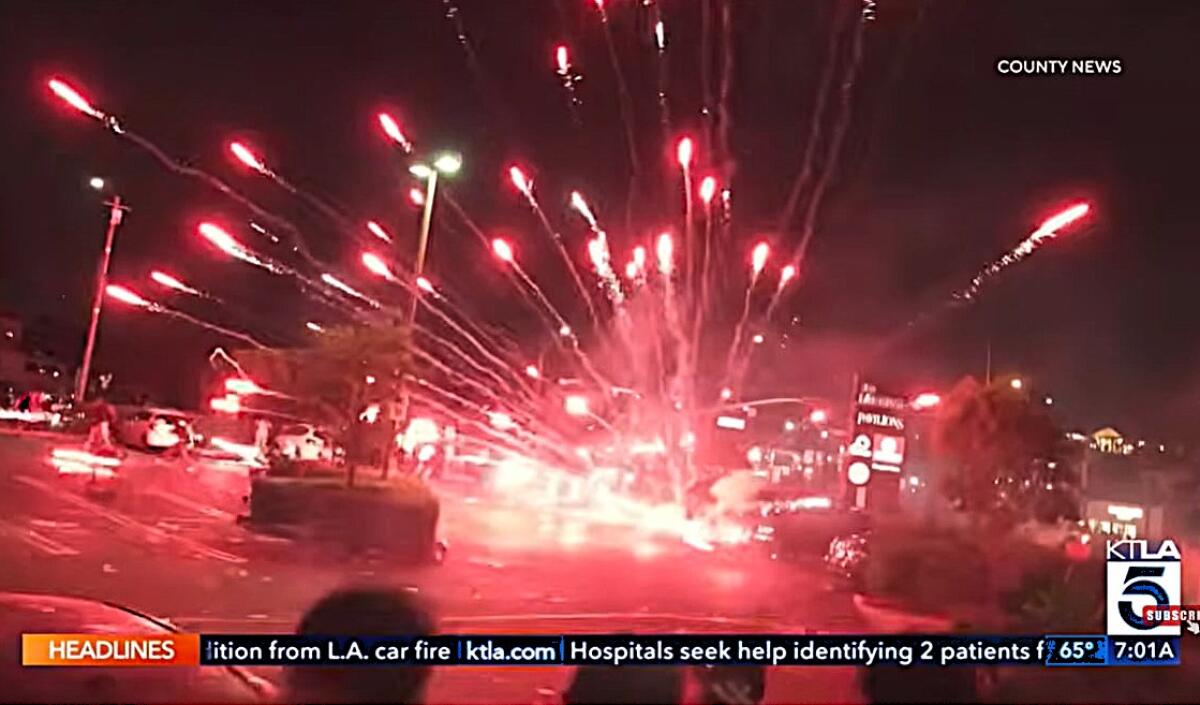 Illegal fireworks go off in Newport Beach Saturday, during a night of chaos that drew a strong police response.