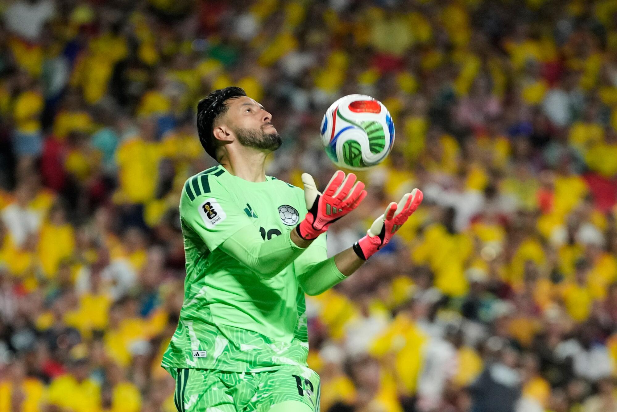Colombia goalkeeper Camilo Vargas catches the ball during a win over Ghana at the World Cup on July 3.