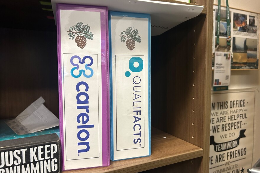 Binders full of documentation for the Children and Youth Behavioral Health Initiative sit in the office of Maggie Hennessy, business manager for Plumas Charter School in Quincy, California. She spent more than two years trying to get a new behavioral health billing program up and running.