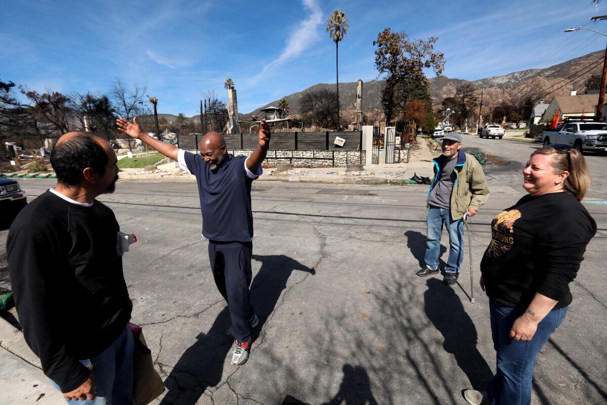 A group of people along West Palm Street in Altadena.