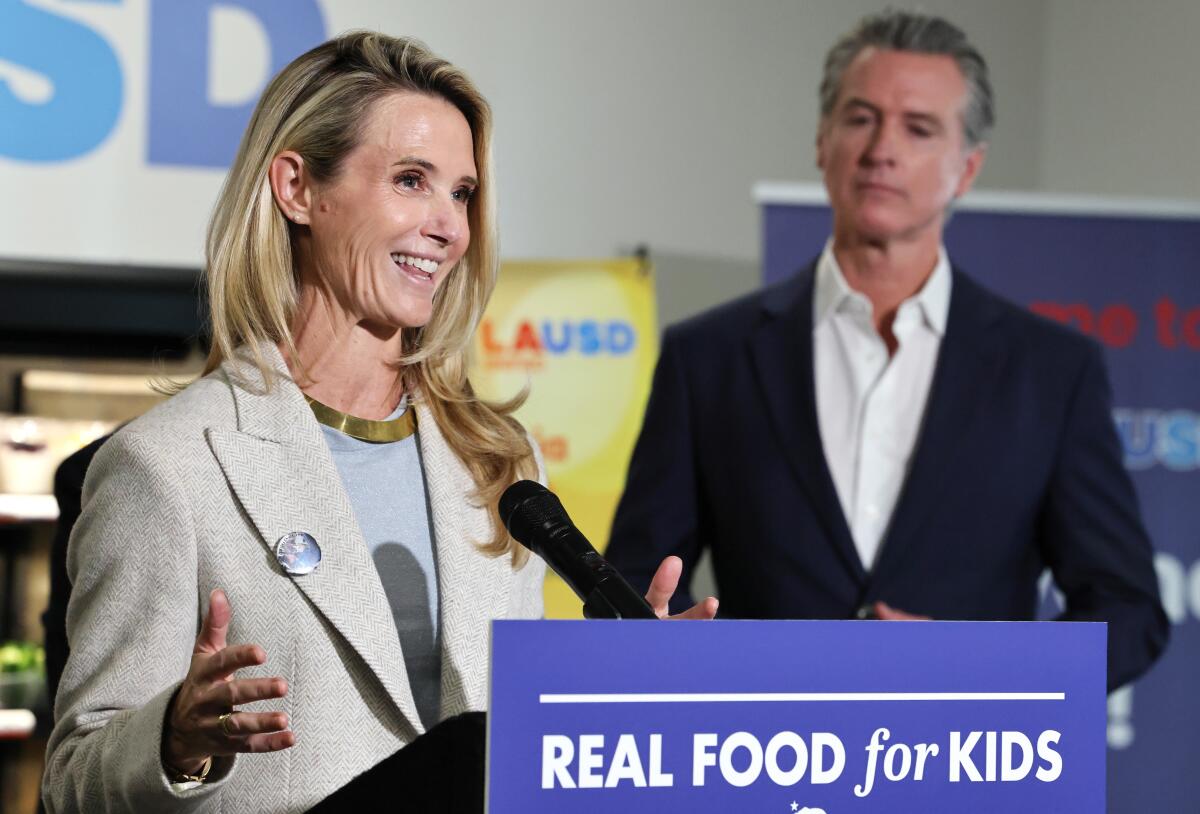 California Governor Gavin Newsom looks on as his wife Jennifer Siebel Newsom 