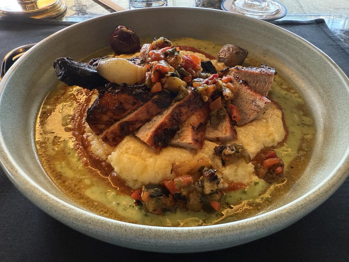 The al pastor pork chop at Lamplight Lounge.