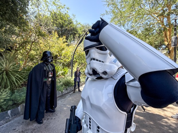 A storm trooper protects Darth Vader at Star Wars: Galaxy's Edge inside Disneyland on Wednesday, April 29, 2926, in Anaheim. Disney is changing up Batuu, adding Darth Vader, Luke, Skywalker, Han Solo and Princess Leia to the land. (Photo by Jeff Gritchen, Orange County Register/SCNG)