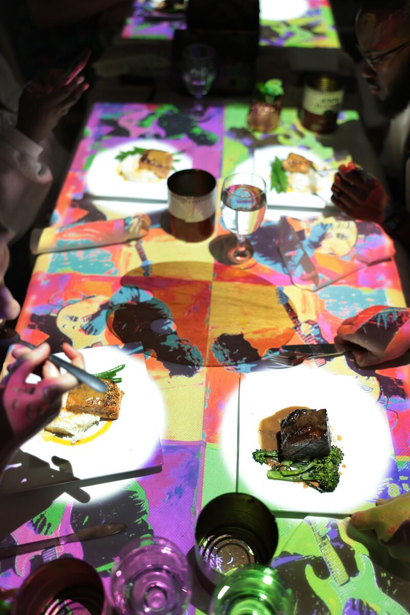 Projections fill up the dining table during meals.