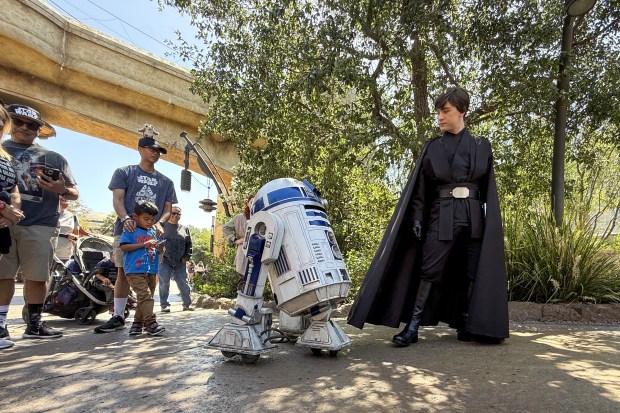 Luke Skywalker and R2-D2 greet visitors at Star Wars: Galaxy's Edge inside Disneyland on Wednesday, April 26, 2926, in Anaheim. Disney is changing up Batuu, adding Darth Vader, Luke, Skywalker, Han Solo and Princess Leia to the land. (Photo by Jeff Gritchen, Orange County Register/SCNG)