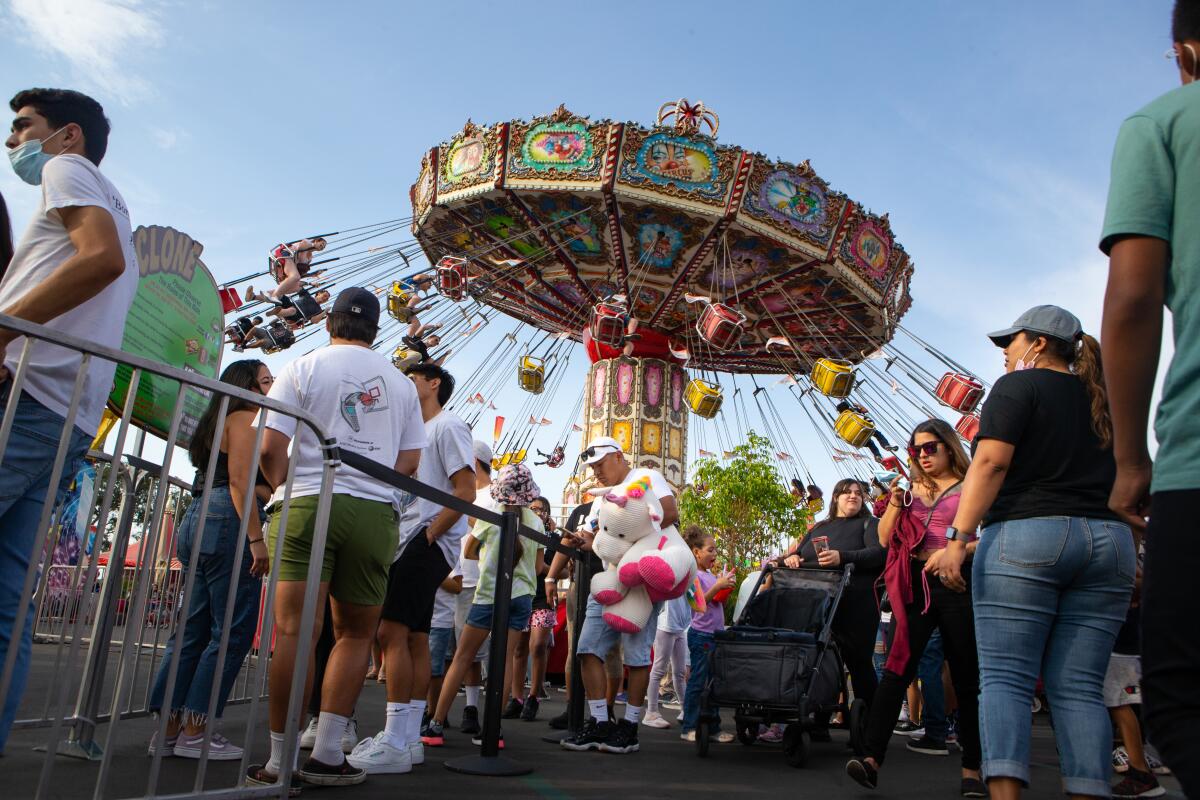 People enjoy a Sunday at the Orange County Fair in Costa Mesa.