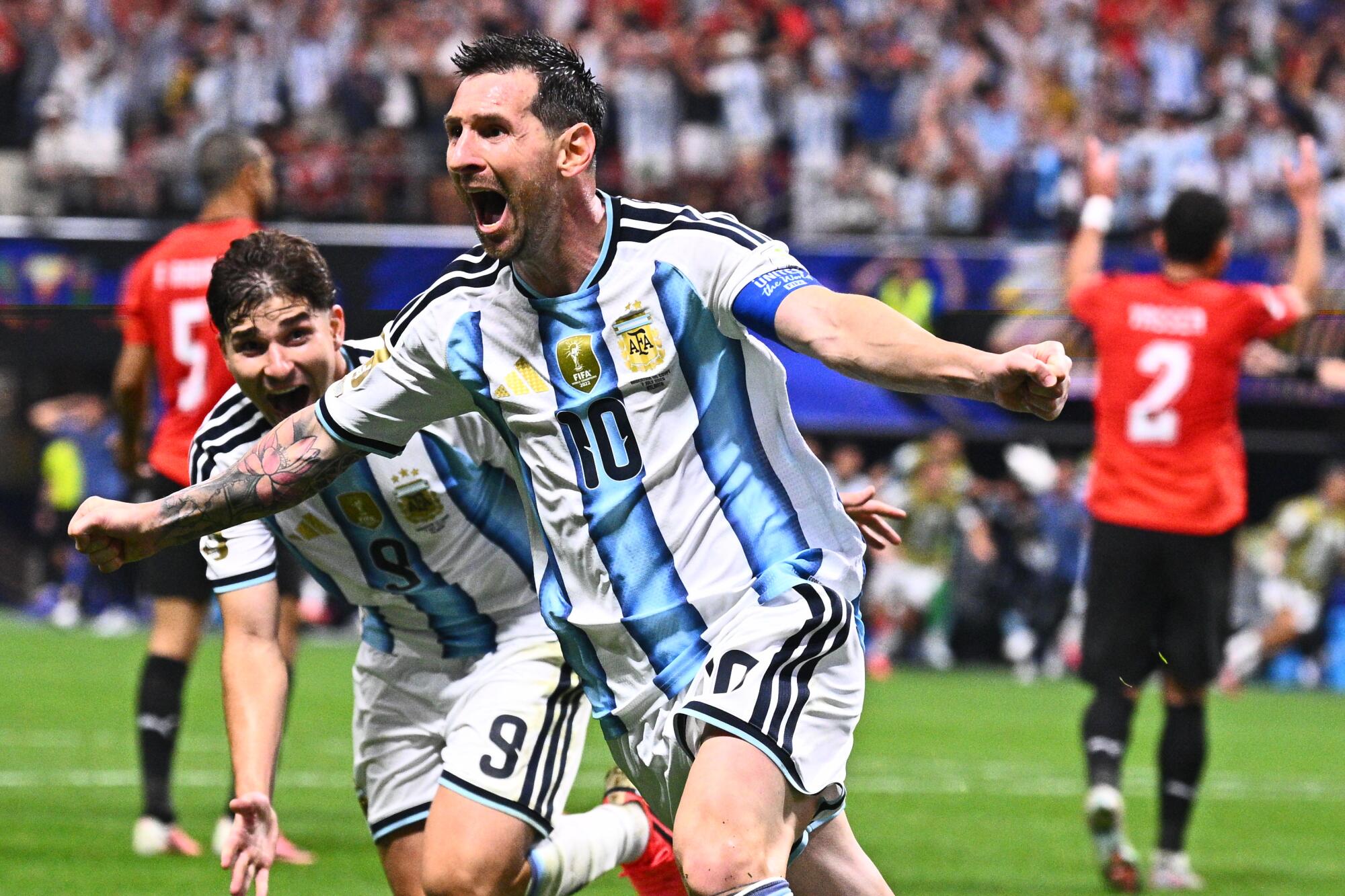 Argentina's Lionel Messi celebrates after scoring against Egypt on July 7 at the World Cup.
