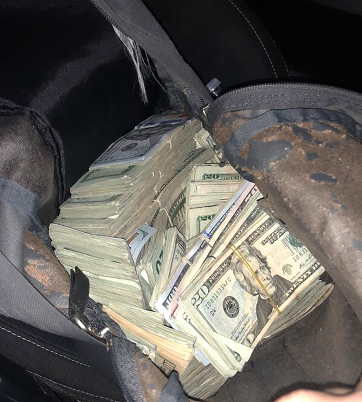 An images from court documents cash allegedly connected to Carlos Paez Pereda.