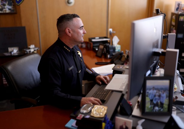 Oakland interim police Chief James Beere works in his office at police headquarters in downtown Oakland, Calif., on Tuesday, March 24, 2026. Beere has applied for the permanent chief's position. (Jane Tyska/Bay Area News Group)