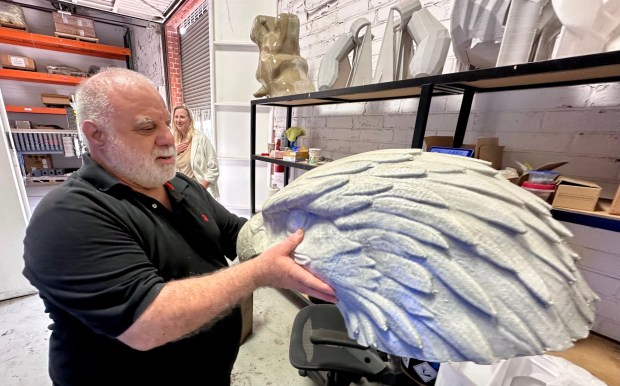 Rando Productions CEO Joe Rando with a 3D printed eagle's head used to create the America250 Rose Parade float. (Photo by Brady MacDonald, Orange County Register/SCNG)