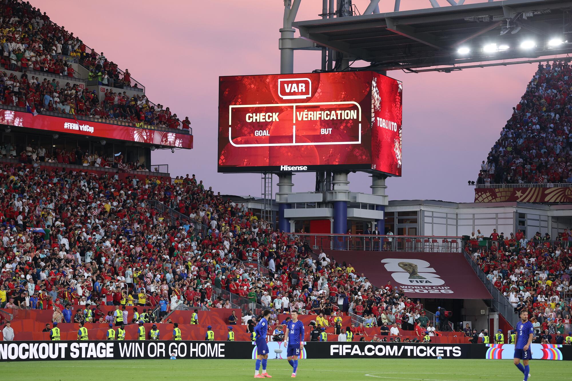 A video screen at Toronto Stadium alerts VAR is reviewing a goal scored by Croatia during a World Cup match.