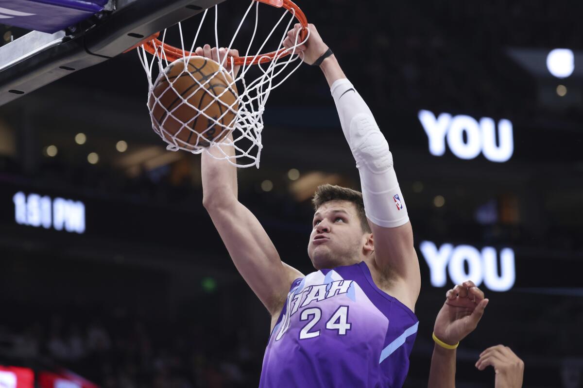 Walker Kessler dunks during a game between the Utah Jazz and Cleveland Cavaliers on March 23.
