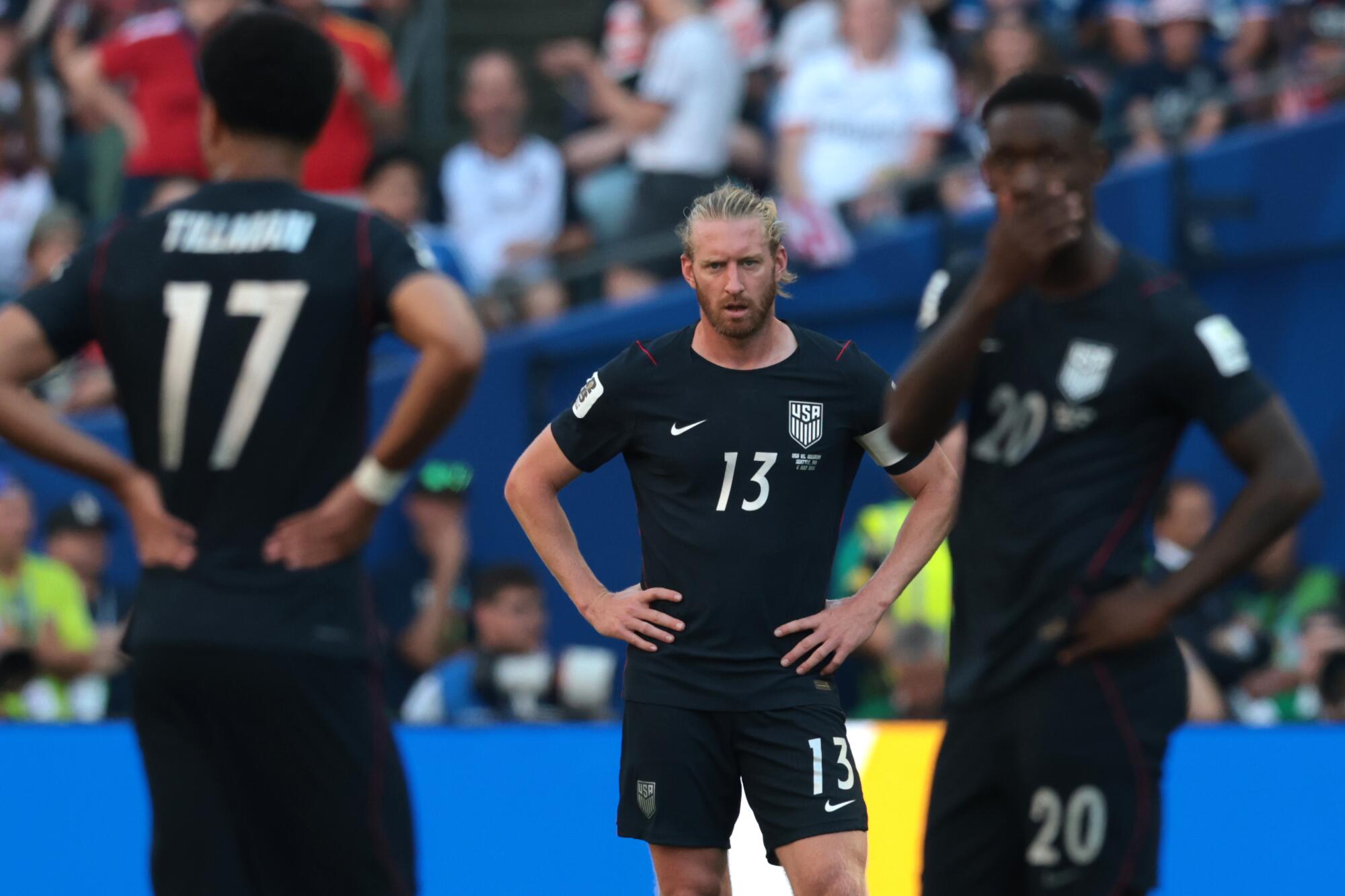 U.S. defender Tim Ream, midfielder Malik Tillman and forward Folarin Balogun reacted after Belgium scored.