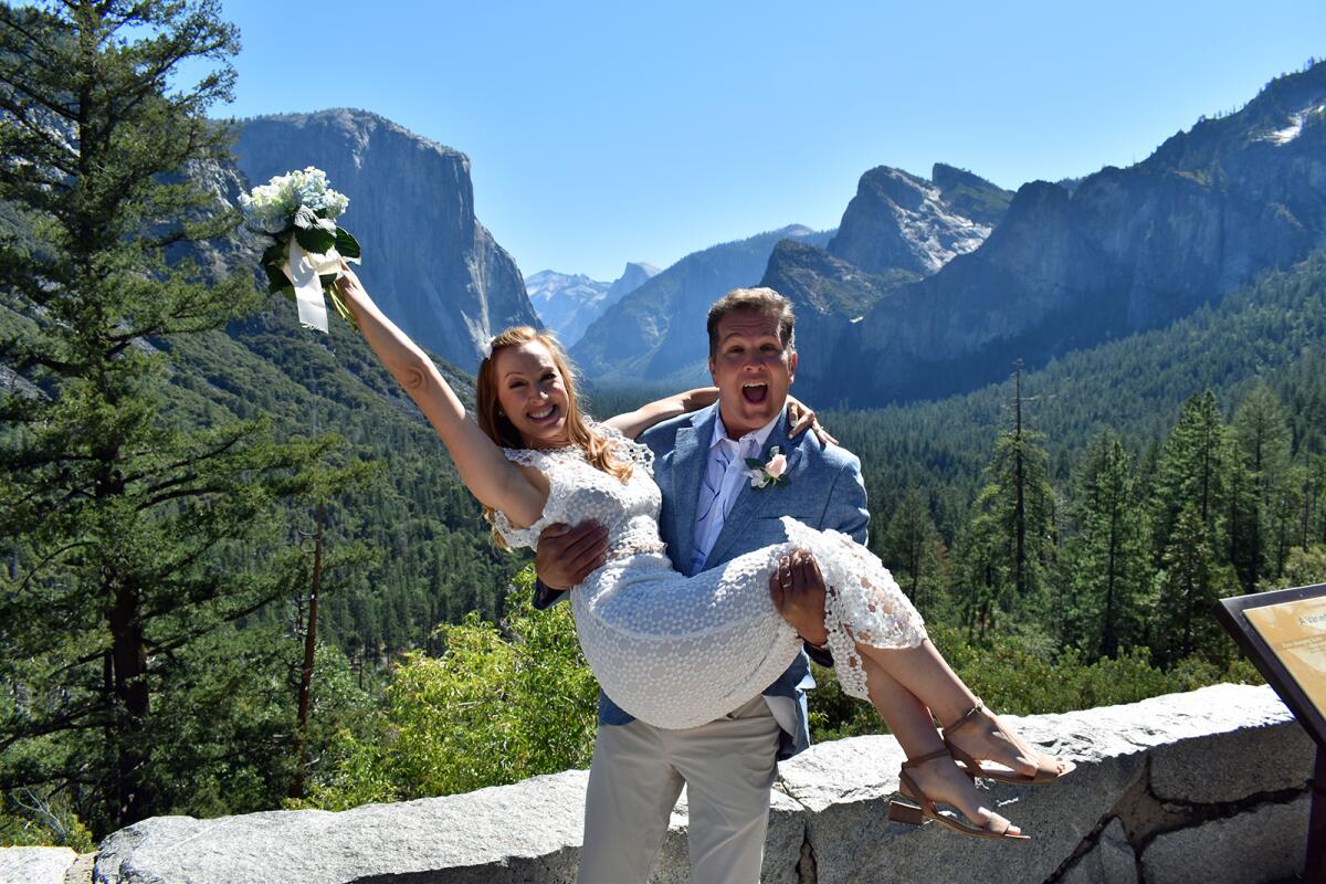 Susan Huckle and Paul Preston, visiting locations on a California bucket list, married in Yosemite Valley.