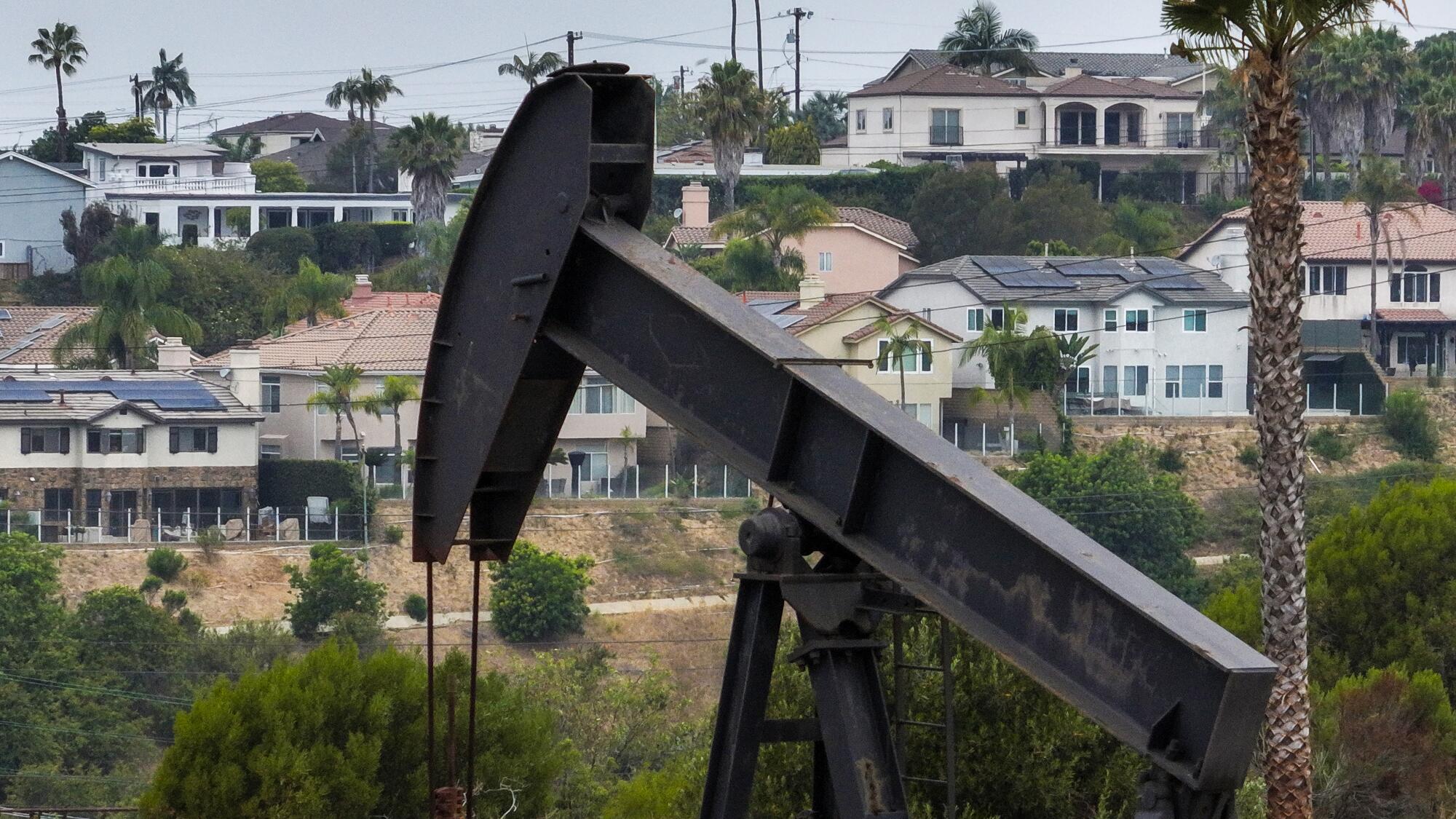 Los Angeles, CA - June 23, 2026: A drone's eye view of oil rigs in Baldwin Hills in Los Angeles, June 23, 2026. 