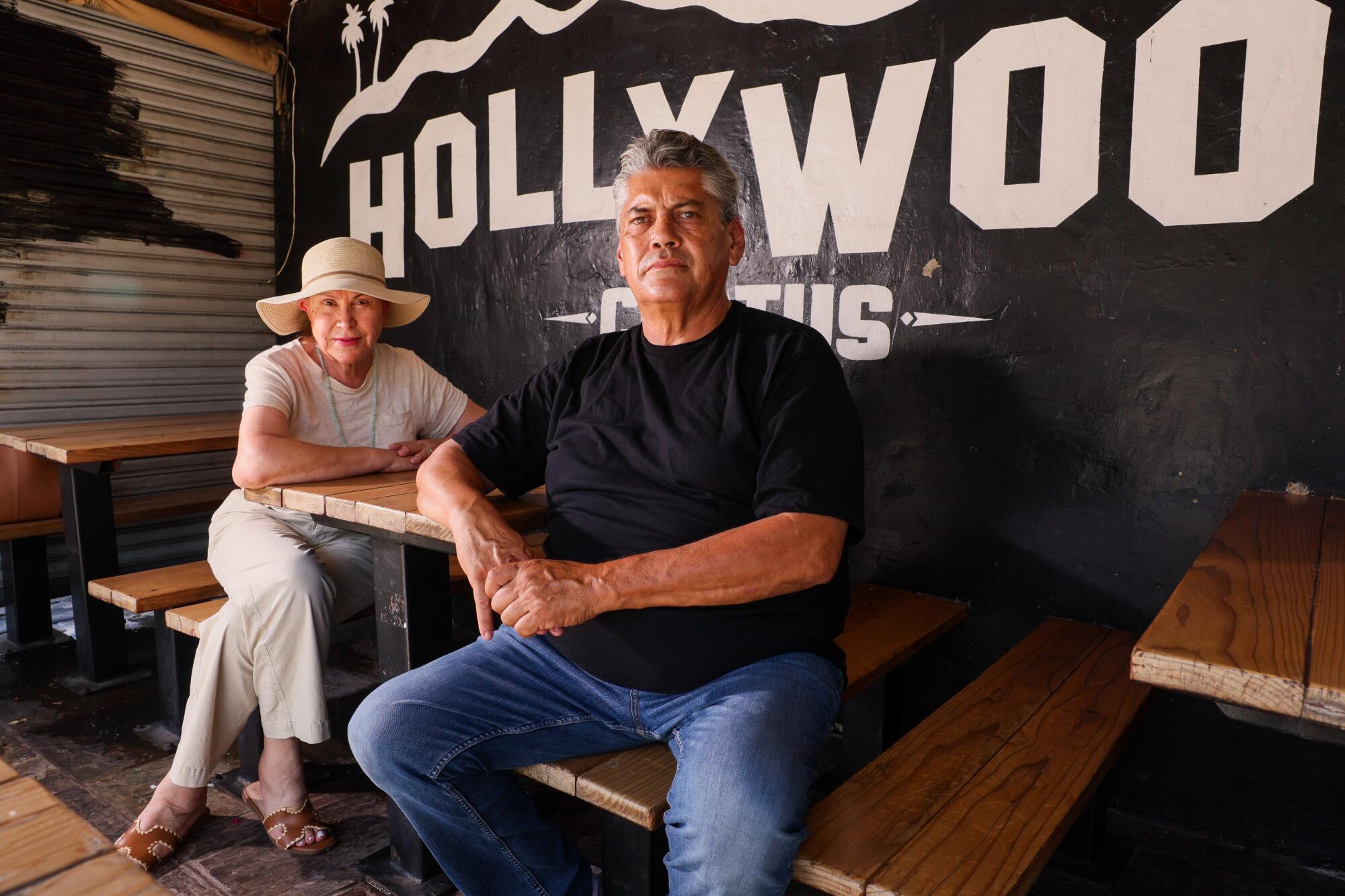 Owners and husband and wife Mario Tornel and Martha Silva sit in Cactus Taqueria no. 1