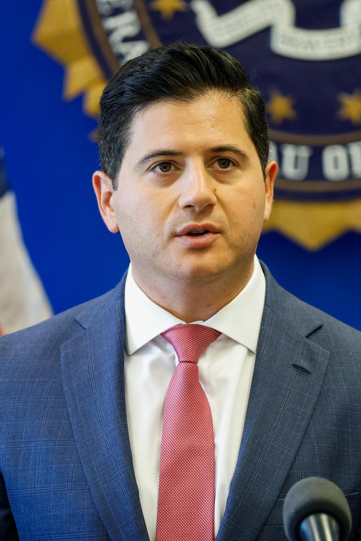 Bill Essayli in a suit