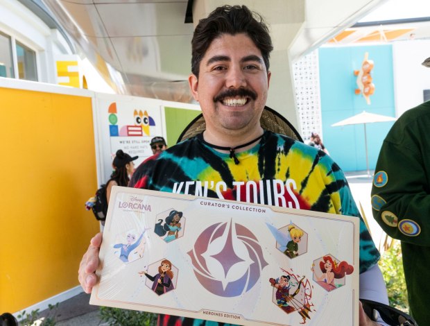 Javier Barcena holds his box of newly released Lorcana Curator's Collection: Heroines Edition at Downtown Disney in Anaheim on Friday, July 17, 2026. (Photo by Paul Bersebach, Orange County Register/SCNG)