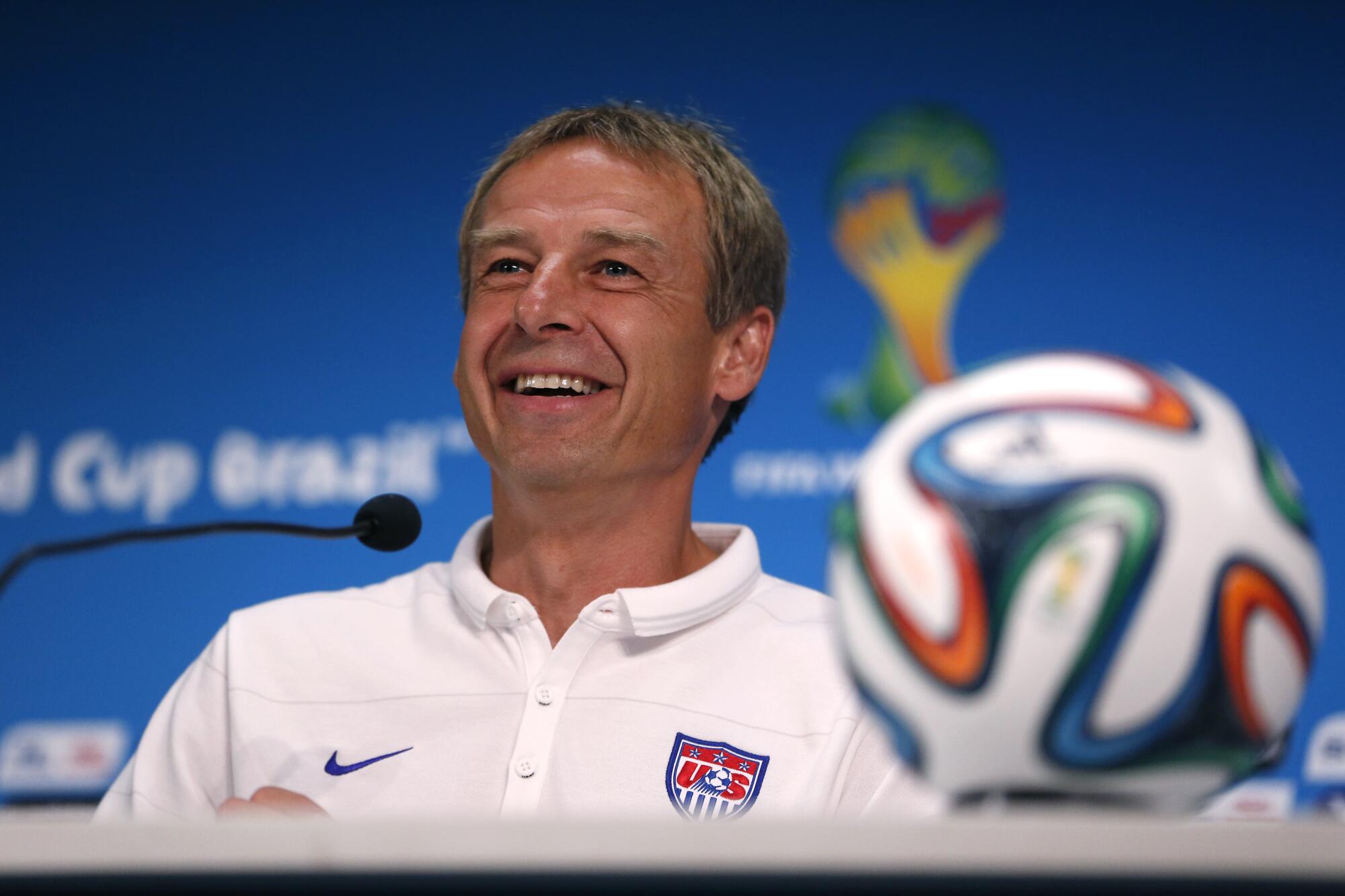 Jurgen Klinsmann addresses the media during a news conference before the U.S. played Portugal in World Cup group game in 2014