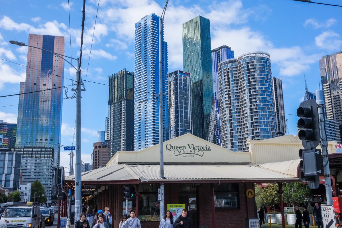 A view of Queen Victoria Market in Melbourne, Australia, with the downtown skyline in the background