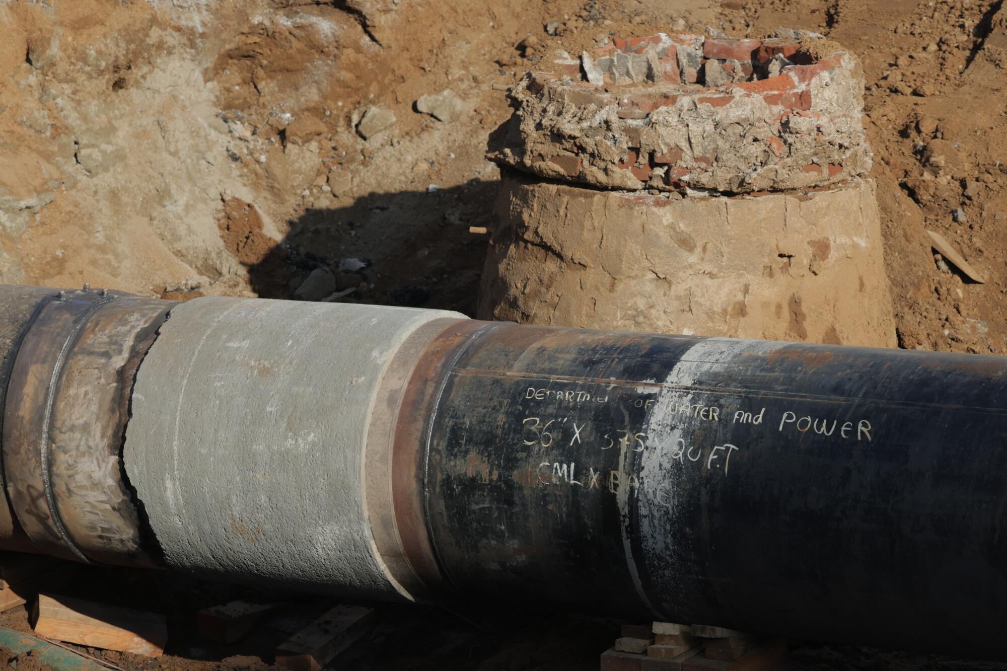 Repairs to a water main on Sunset Boulevard Saturday in West Hollywood.