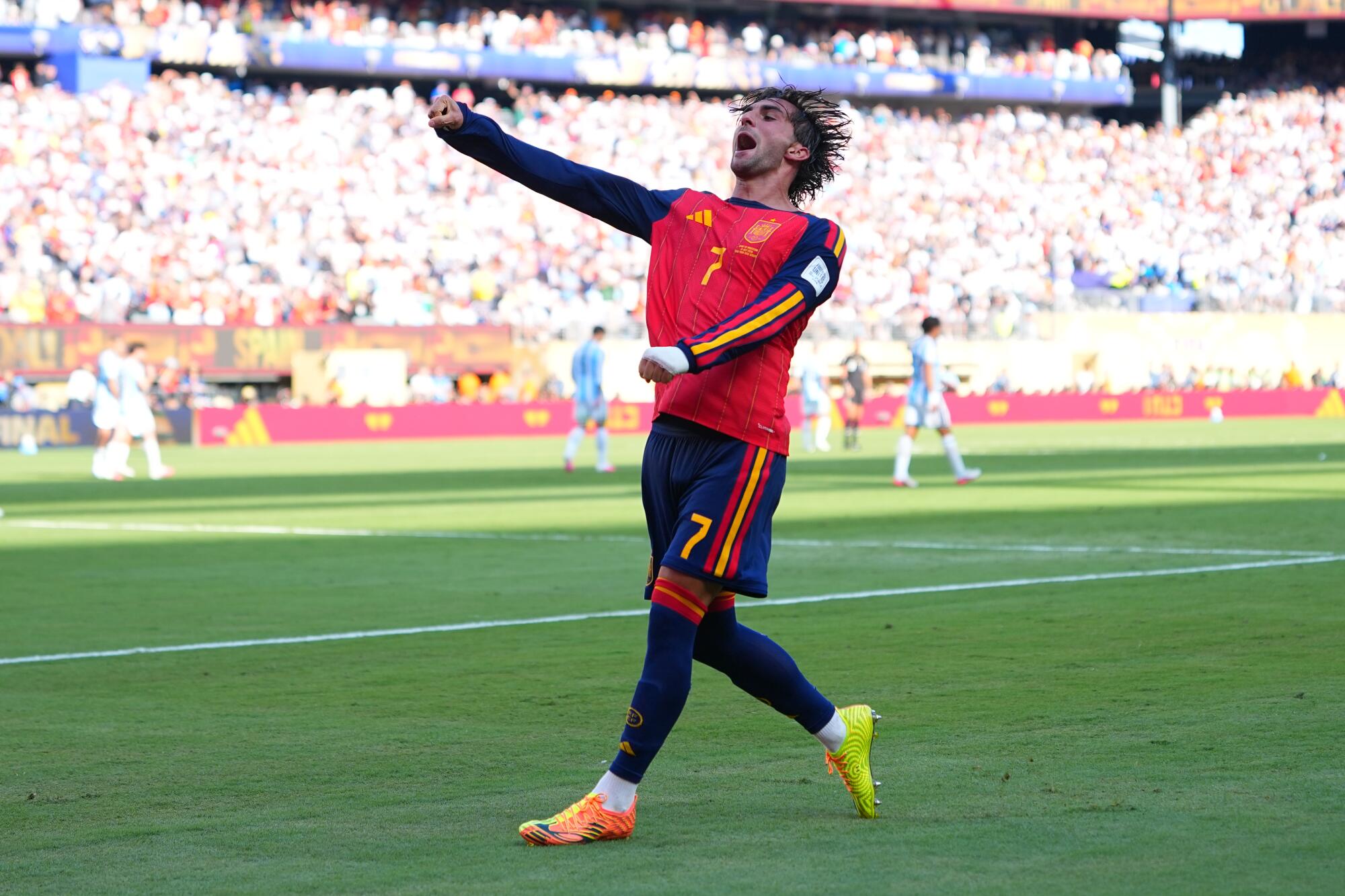 Spain's Ferran Torres celebrates after scoring in extra time against Argentina in the World Cup final Sunday.