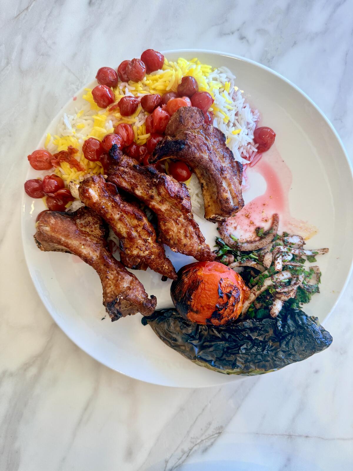 Pork ribs with albaloo polo from Adana in Glendale.